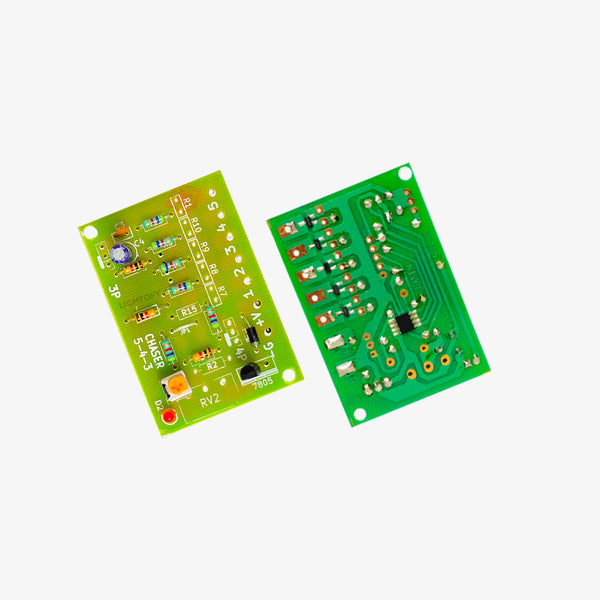 A green printed circuit board with components and LED lights arranged in a line.
