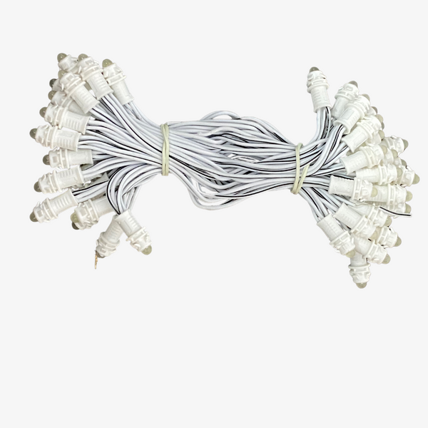 A bunch of 12 volt RGB LED lights with a 5-inch gap between each LED, featuring white connectors and a clear wire.