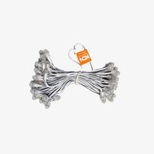 A bundle of 12 volt copper wire with single color SMD LEDs, approximately 5 inches apart, against a white background.