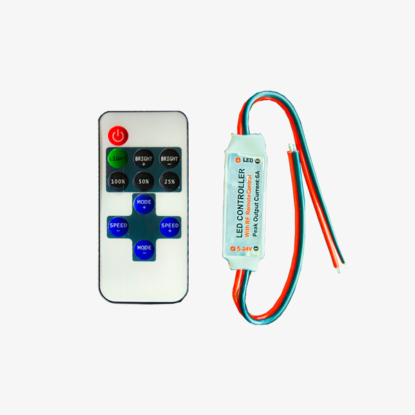 A remote control with buttons and a connected wire, presumably for controlling LED lighting.
