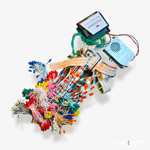 Colorful electronic components and wires on a white background