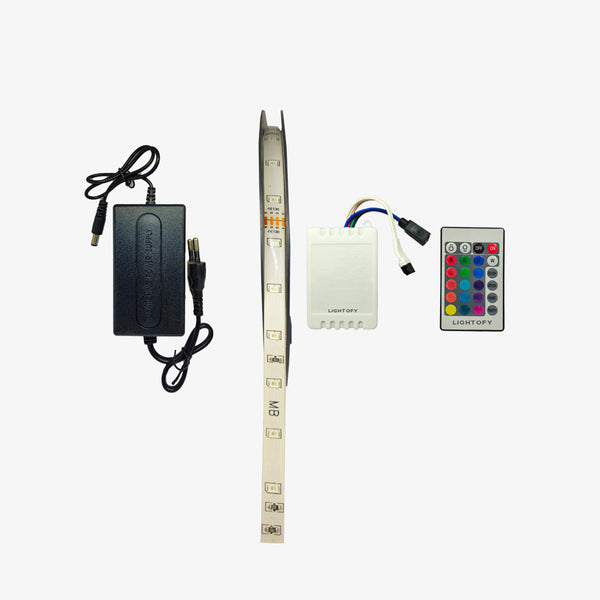 An LED strip kit which includes a silver-colored LED strip, a black power adapter, a white LED controller, and a remote with buttons.