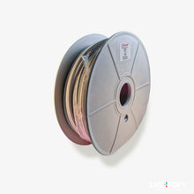 Spool of filament with a visible brand label on a white background