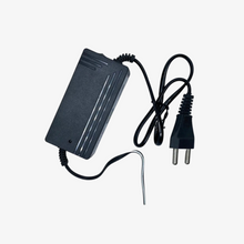 A beige 5 volt power adapter with a two-prong EU plug on one end and a US-style plug on the other. The adapter has a white body with a label and multiple cables attached.