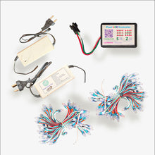 Pixel LED controller with power supply, connectors, and LED strings on a white background