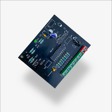 Electronic circuit board with various components on a white background