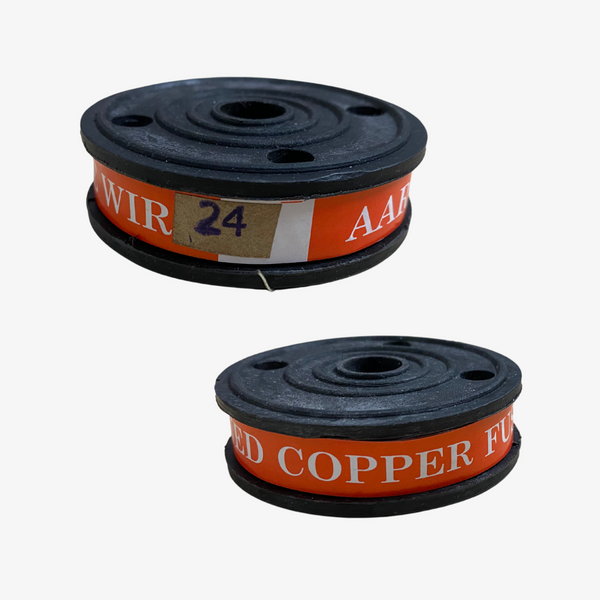 Two spools of copper tin wire with red and black labeling