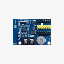 A blue circuit board module which is a single color Wi-Fi controller, labeled with 'W2' and various electronic components such as capacitors, resistors, and integrated circuits.