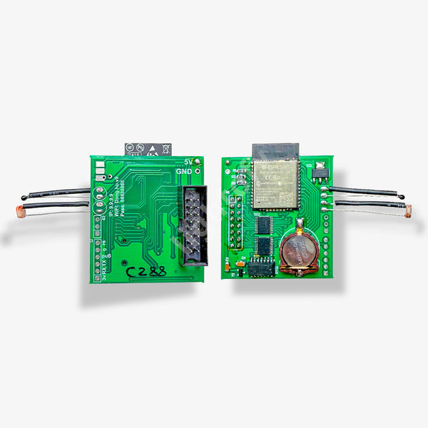 Two green electronic circuit boards with components on a white background