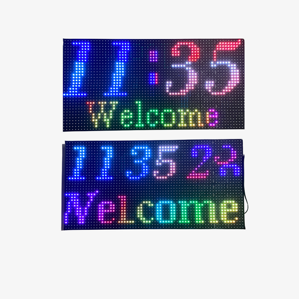 Two digital clocks displaying time and text in multicolored LED lights.
