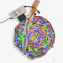 Multicolored LED strip with a power supply on a white background