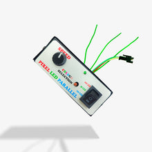 A Pixel LED manual parallel controller with a dial and several wires.