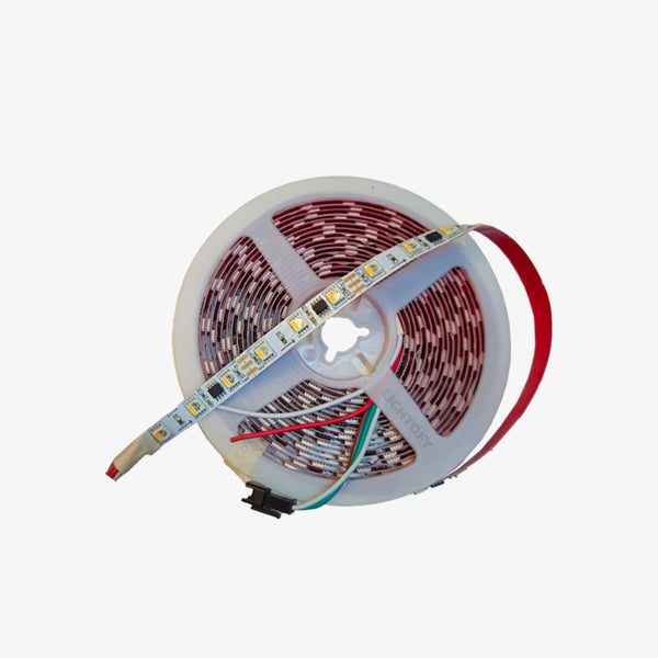A spool of RGBW pixel LED strip light with red, green, blue, and white LEDs visible.