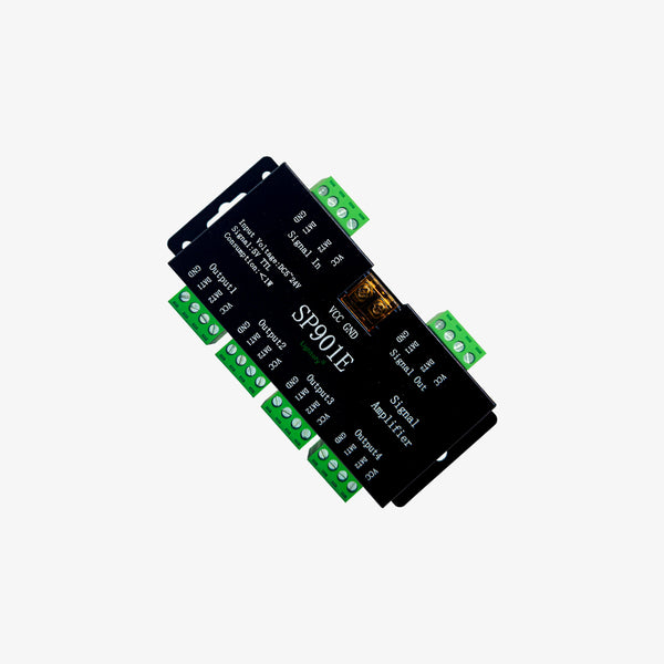 A black PIXEL LED signal amplifier with green connectors, model SP901E.