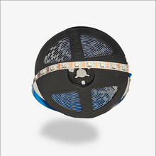 Spool of LED strip light on a white background