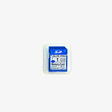 A blue and white SD memory card with the label '1 GB' and 'ELITE PRO' branding on it.
