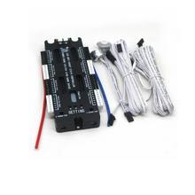 A stair controller with various components including wires, a connector, and a setting dial.