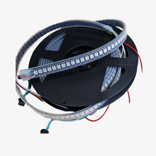 An addressable pixel LED strip with individual LEDs visible, connected to a microcontroller chip, and surrounded by a black casing.